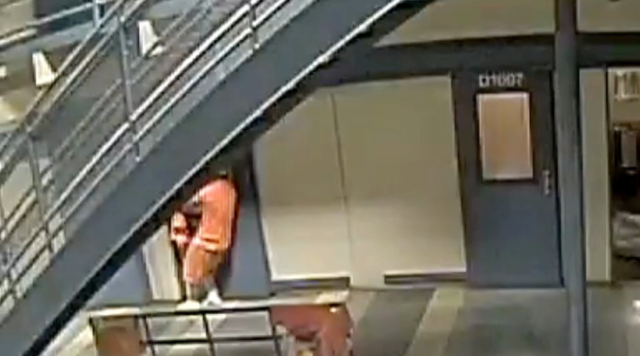 Inmates at Orleans Justice Center pull open a cell door the sheriff said was defective