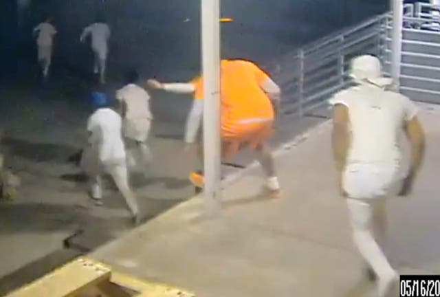 <p>Inmates at Orleans Justice Center flee from a loading dock last Friday</p>