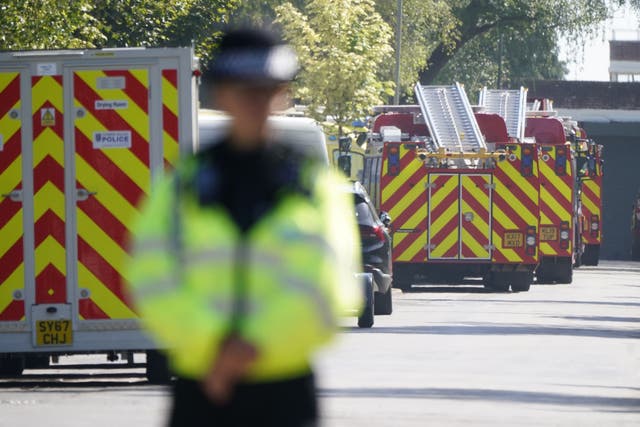 Emergency services near the scene of the fire at Bicester Motion (Andrew Matthews/PA)