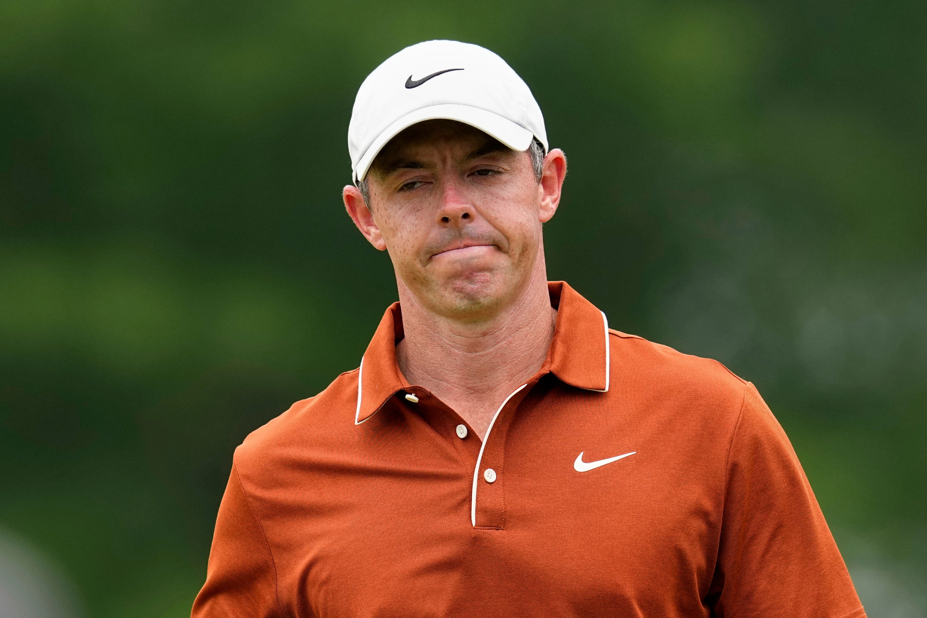 Rory McIlroy faced a long wait to begin round three of the US PGA Championship due to bad weather (David J. Phillip/AP)
