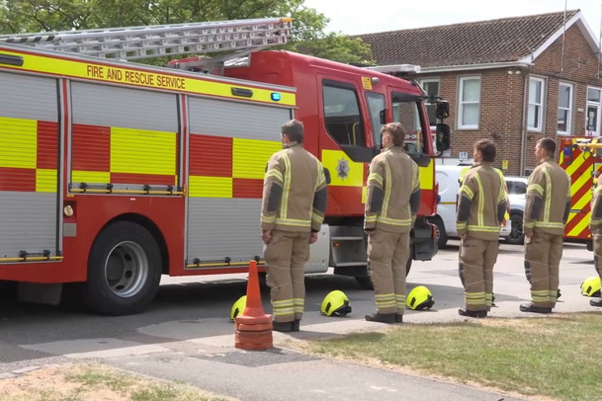 Bicester firefighters’ poignant guard of honour for colleagues who died in ex-RAF base blaze