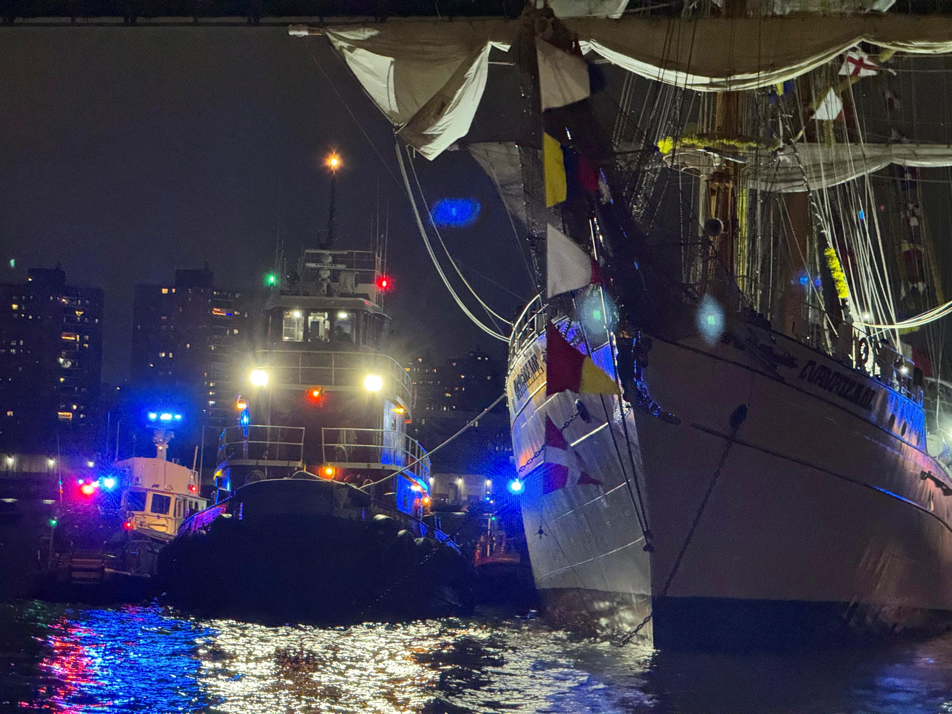 A Mexican Navy training ship is seen in front of the Manhattan Bridge, after it was damaged having run into the Brooklyn Bridge in New York City