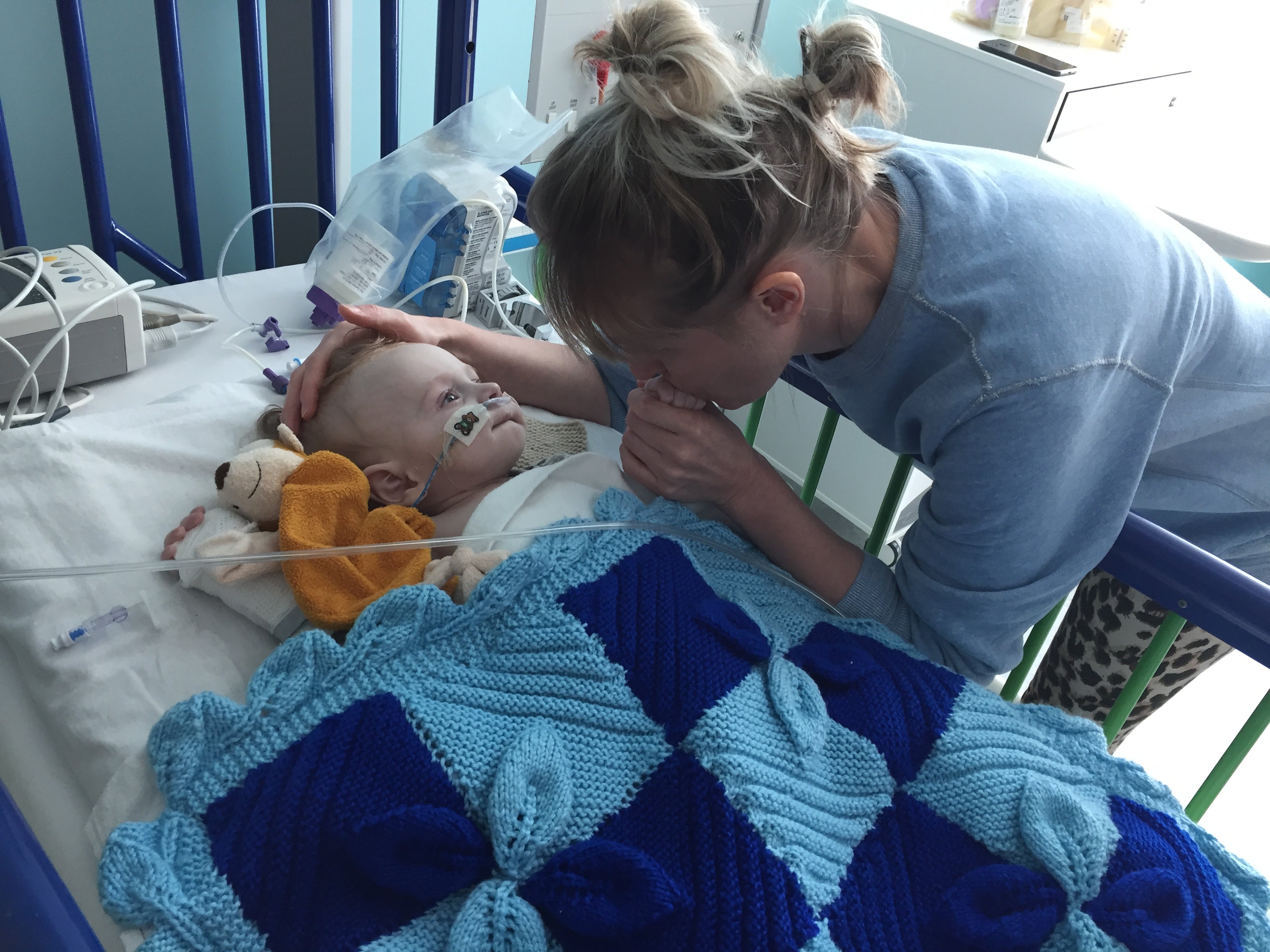 Ms Greenstock with Otis in hospital, preparing for the transplant