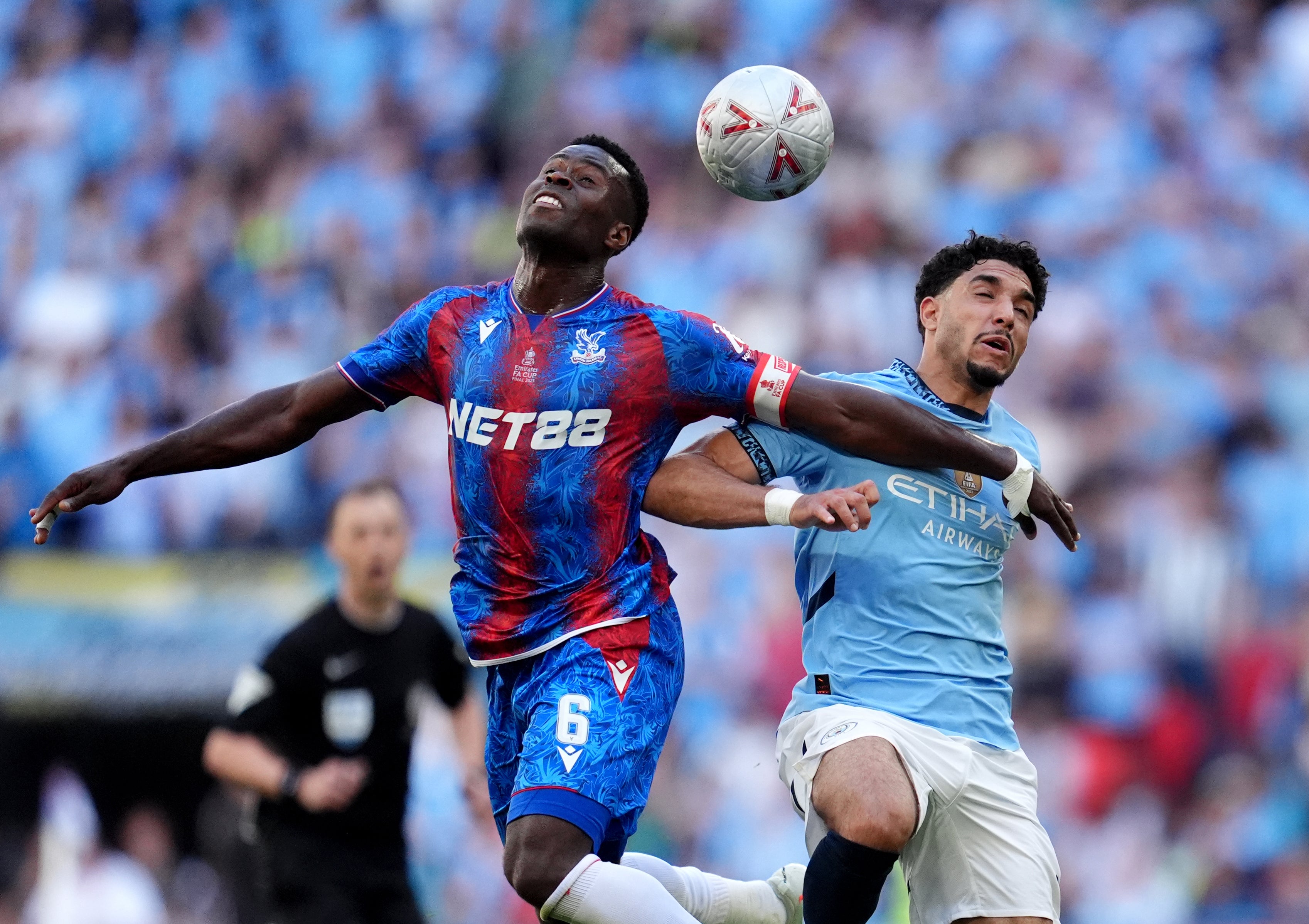 Marc Guehi (left) and fellow defenders Chris Richards and Maxence Lacroix provide a stable base for Crystal Palace