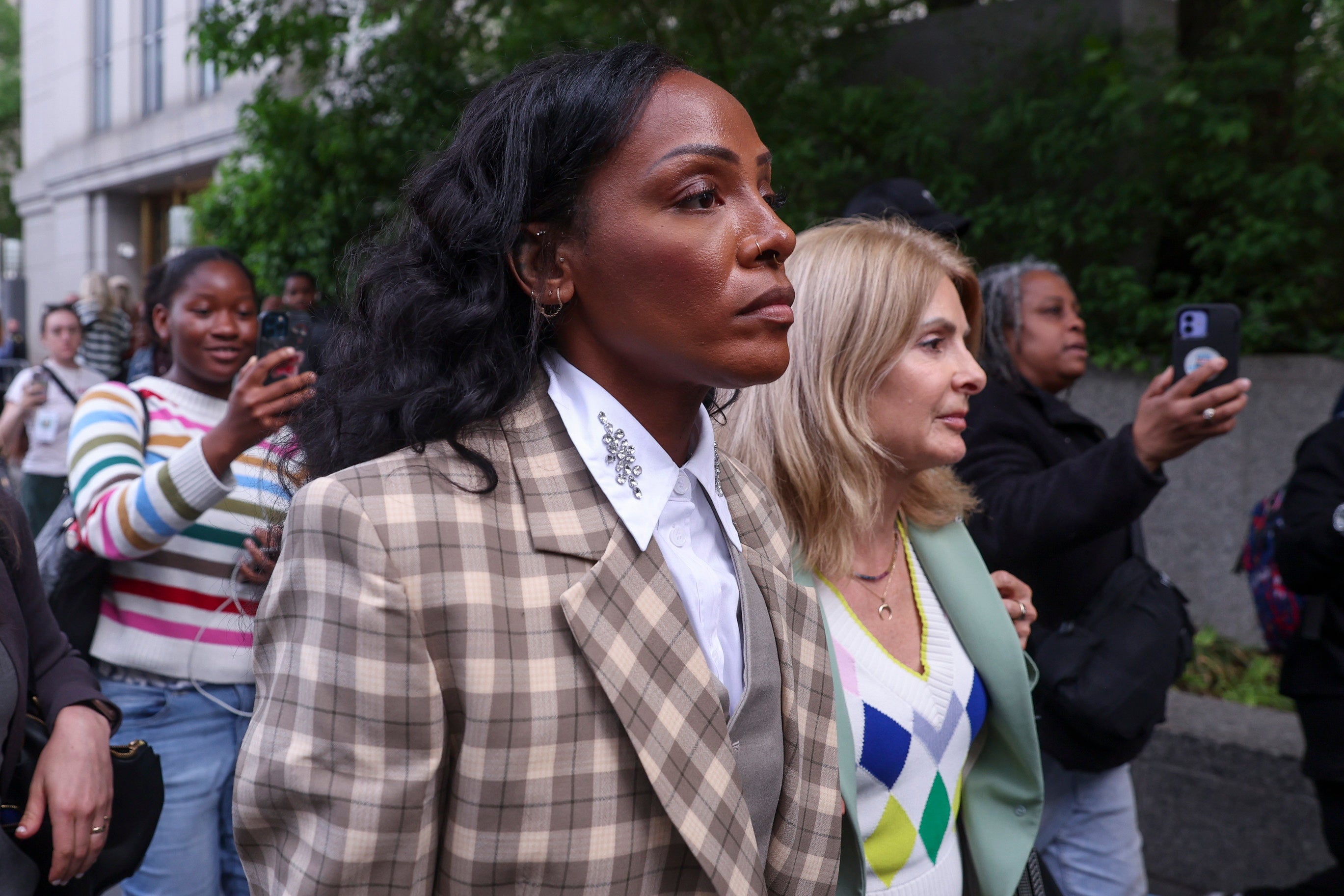 US singer Dawn Richard leaves court after testifying on Friday