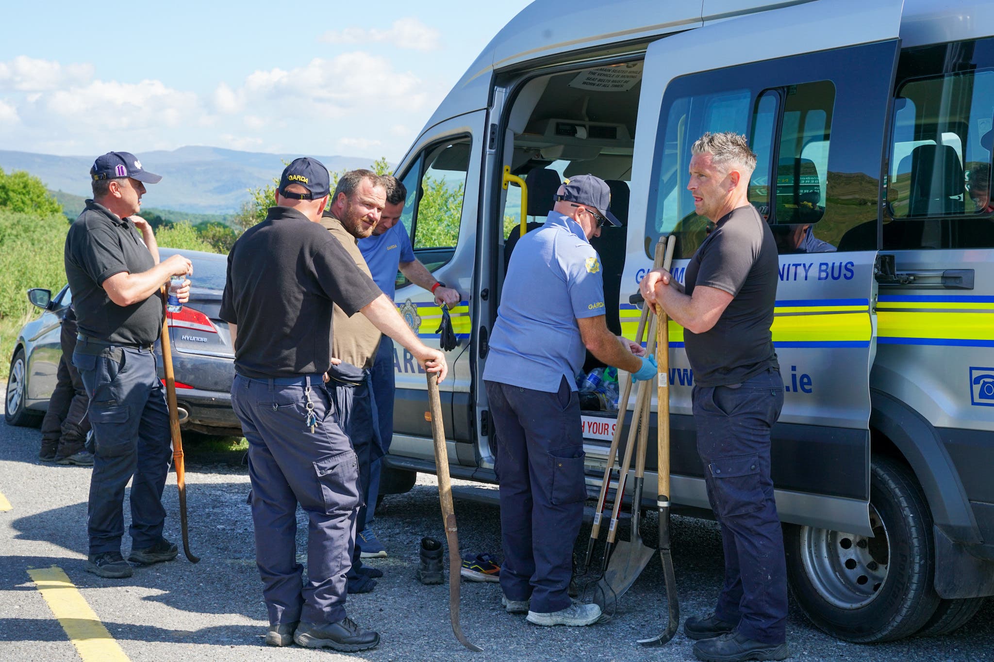 Emergency personnel close to the farm of Michael “Mike” Gaine near Kenmare in Co Kerry (Noel Sweeney/PA)