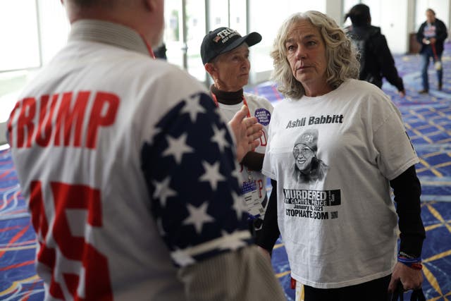 <p>Micki Witthoeft, mother of Ashli Babbitt, talks to a Trump supporter at CPAC. The Trump administration is expected to pay out $5 million to the Capitol rioter’s family to settle a wrongful death lawsuit.</p>