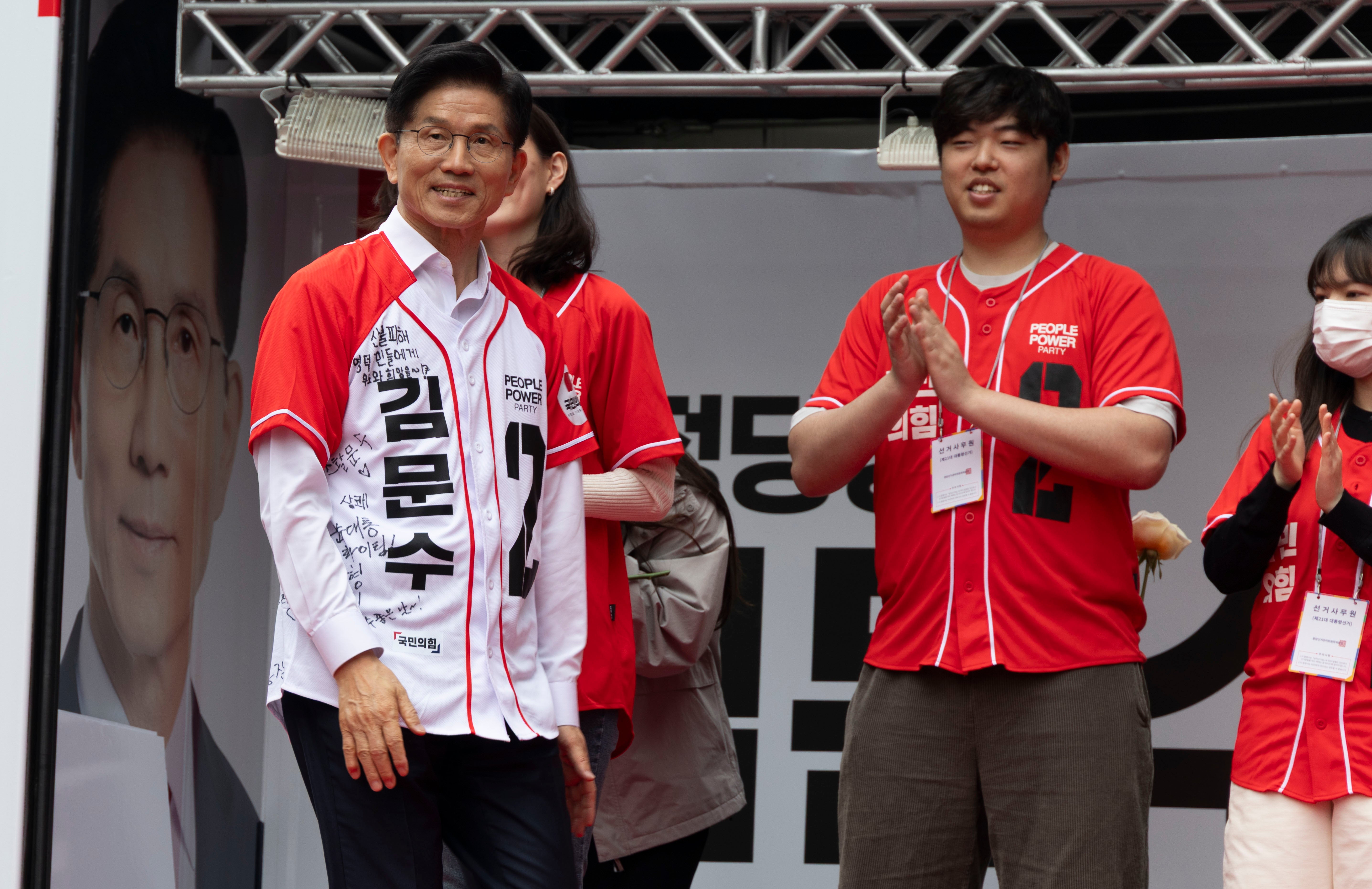 Kim Moon Soo from the People Power Party arrives for the election campaign in Seoul