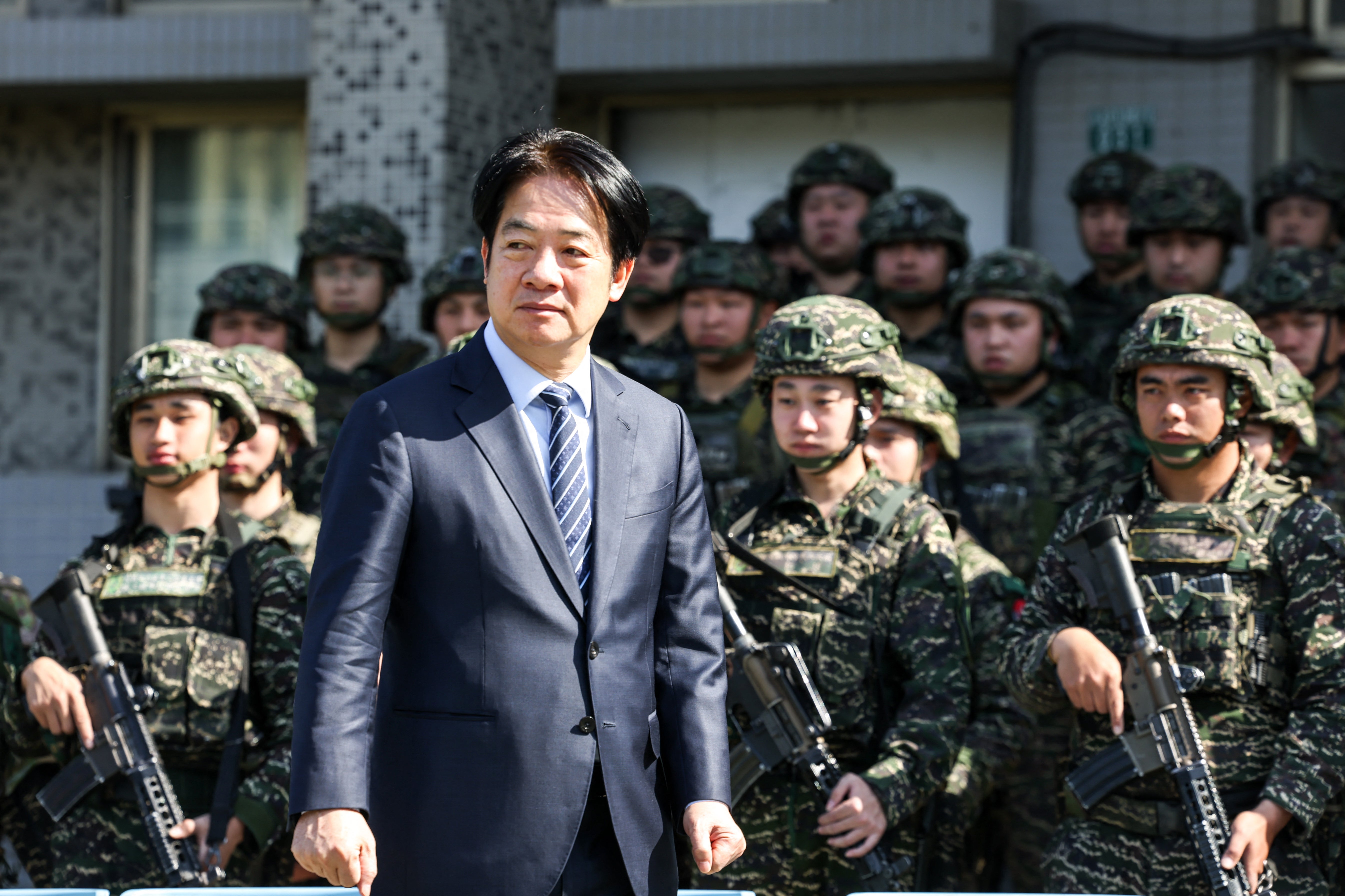 <p>Taiwan's president Lai Ching-te inspects the troops taking part in the Rapid Response Exercise during a visit at the Songshan military airbase in Taipei</p>