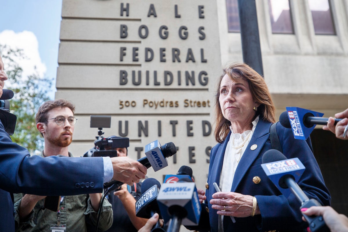 A New Orleans sheriff's office staffer has been arrested following the escape of 10 jail inmates