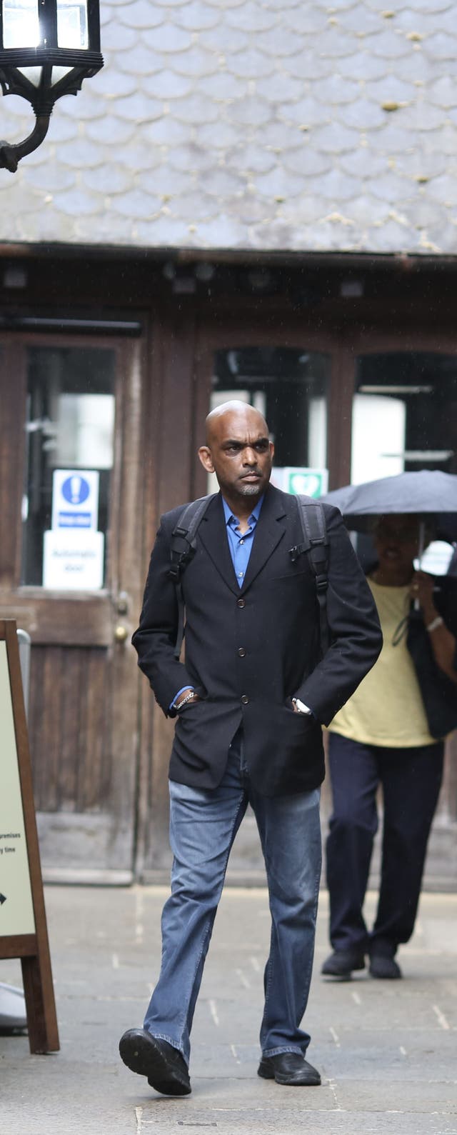 <p>Ricardo (Rik Rok) Ducent outside court</p>