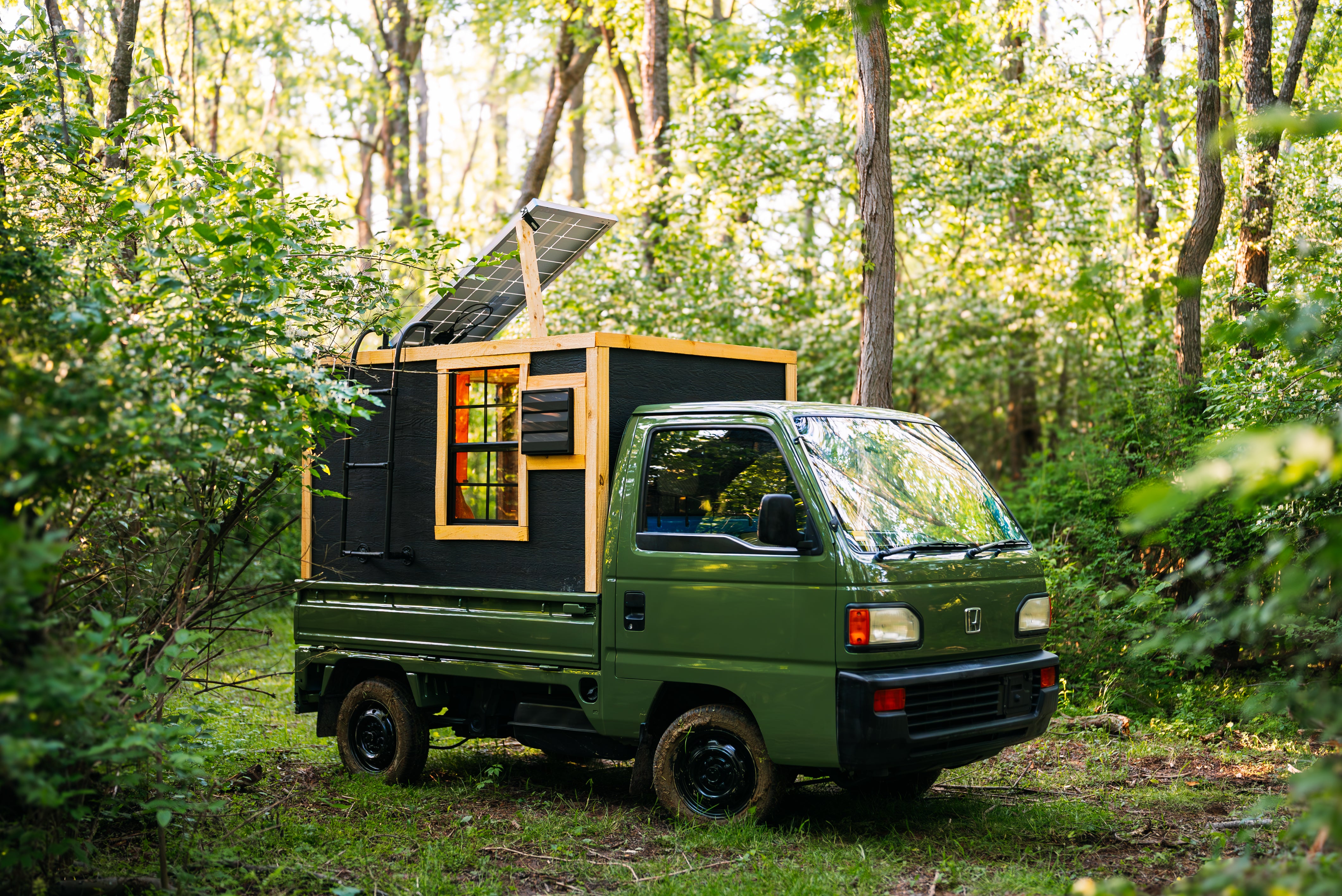 This fully functional camper, built by YouTuber Levi Kelly, has a living space measuring just three by seven feet