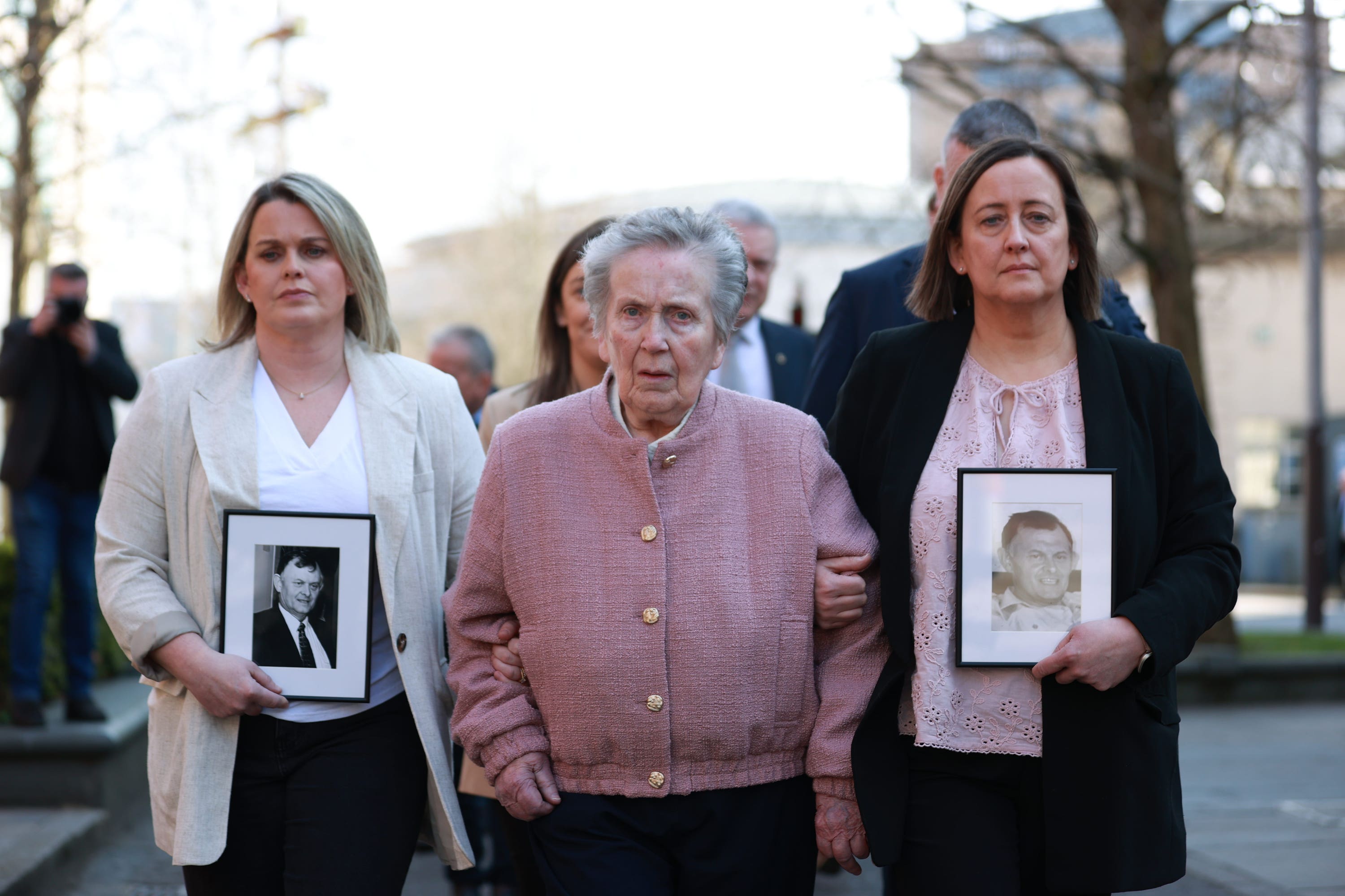 Bridie Brown, the wife of Sean Brown, with his daughters Siobhan Brown (right), Claire Loughran (left) outside the Royal Courts of Justice, Belfast (PA)