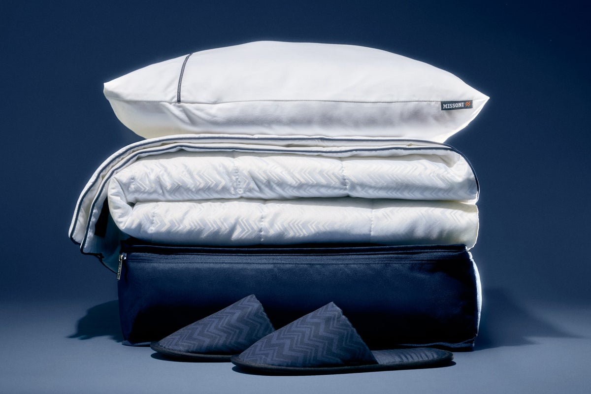 Delta unveils new designer amenity kits and bedding (complete with a cuddle pillow)