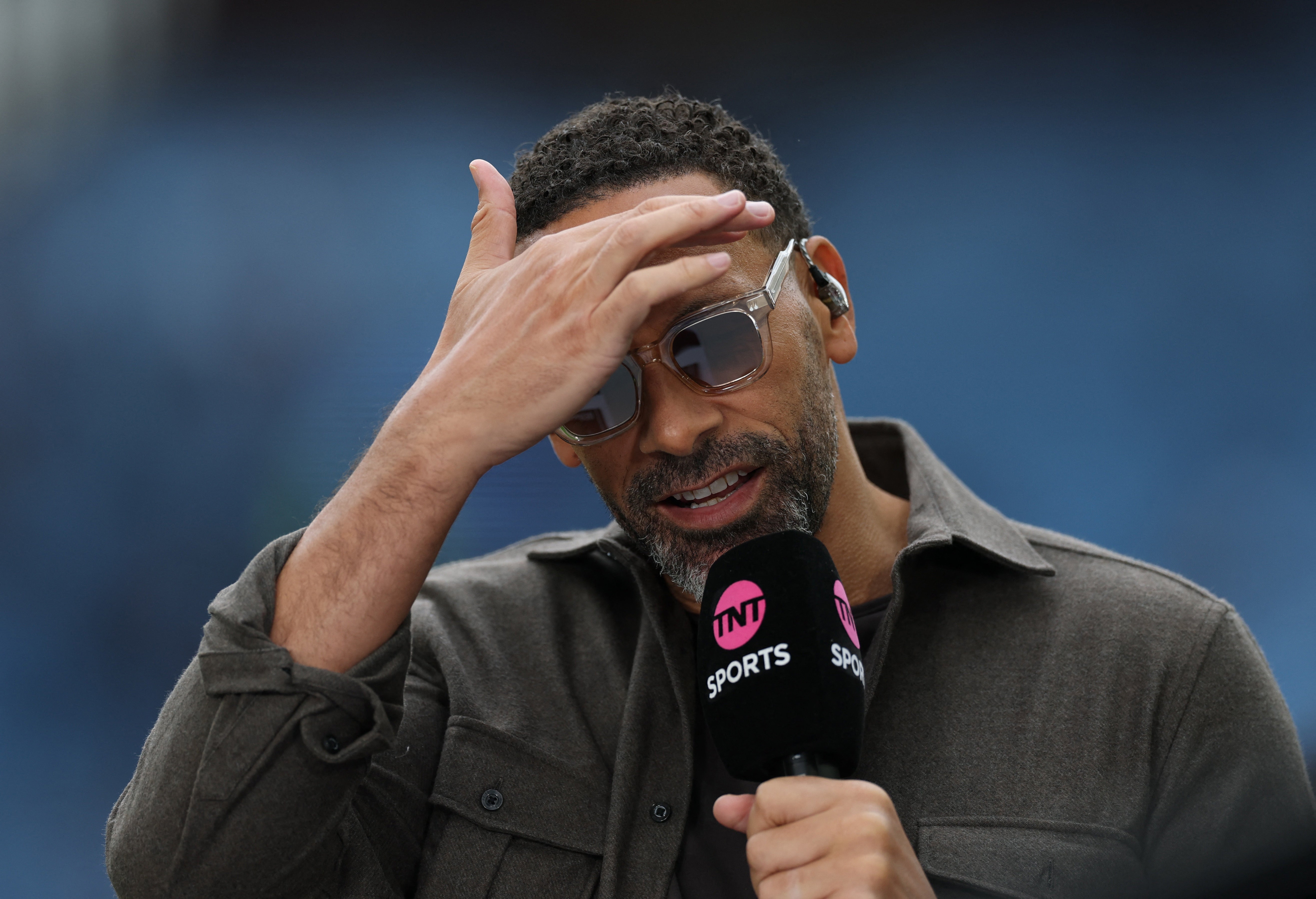 Rio Ferdinand working as a pundit for TNT Sports