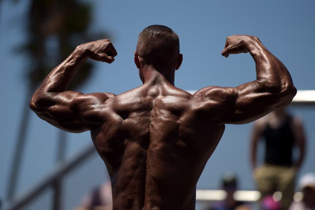 <p>Contestant participates in the Mr. & Ms. Muscle Beach championship</p>