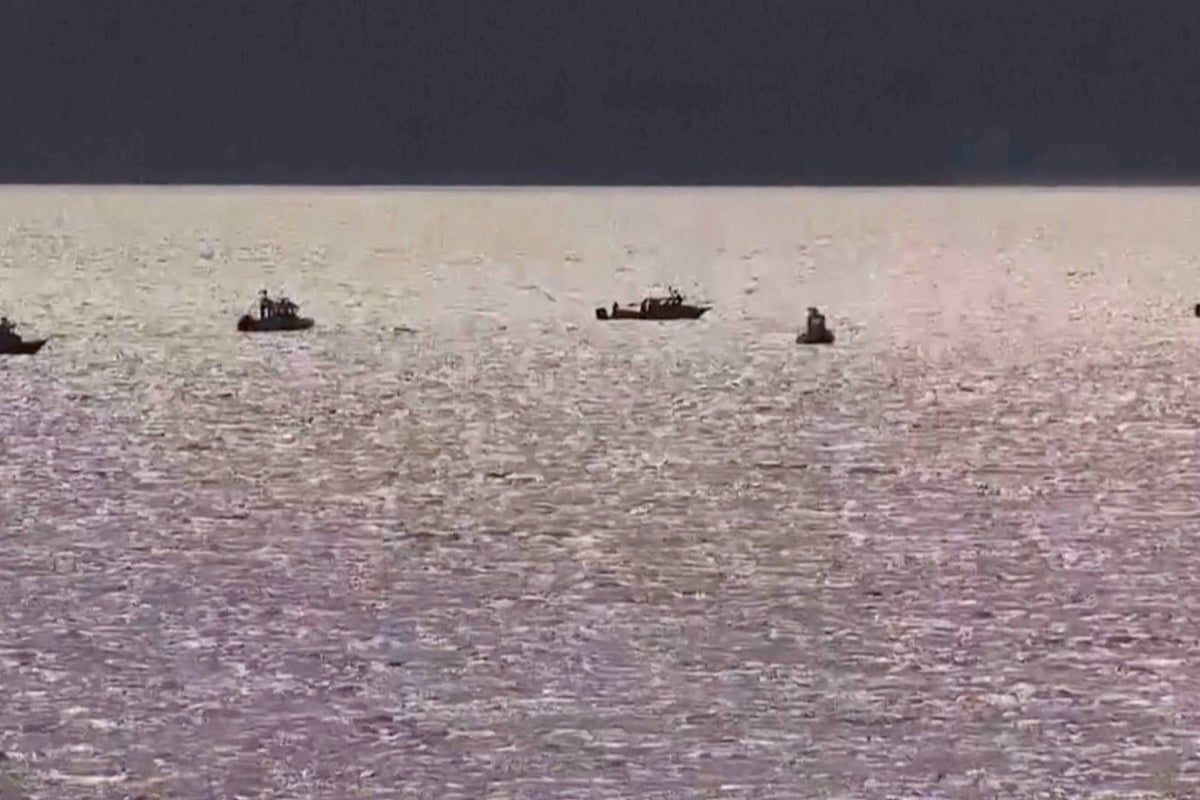 1 person was rescued and a search is underway for 3 others after a boat sinks north of Seattle