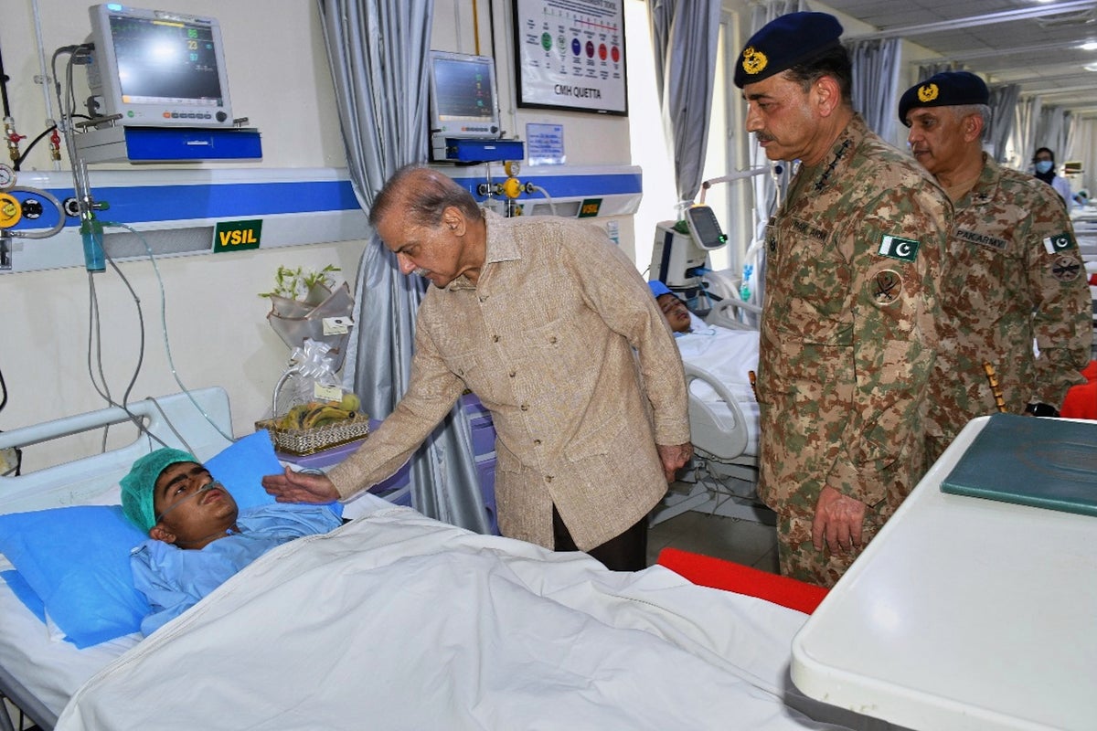 3 girls and 2 soldiers killed in Pakistan school bus bombing are buried