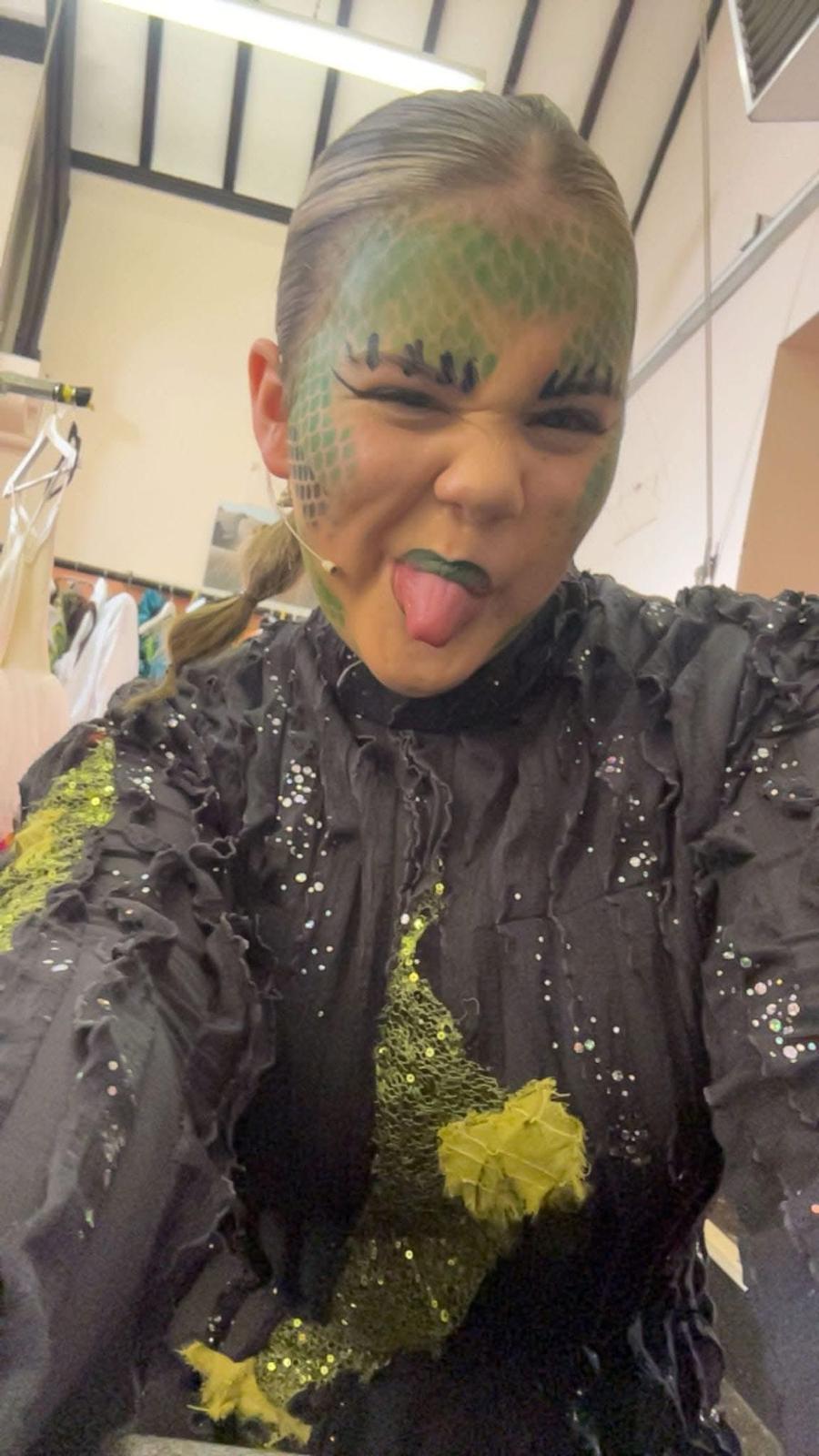 Izzy in costume for a theatre performance