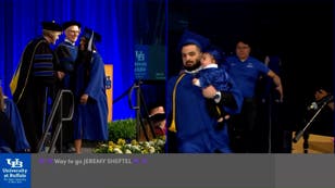 Dad evades security stopping him taking son on stage to get diploma