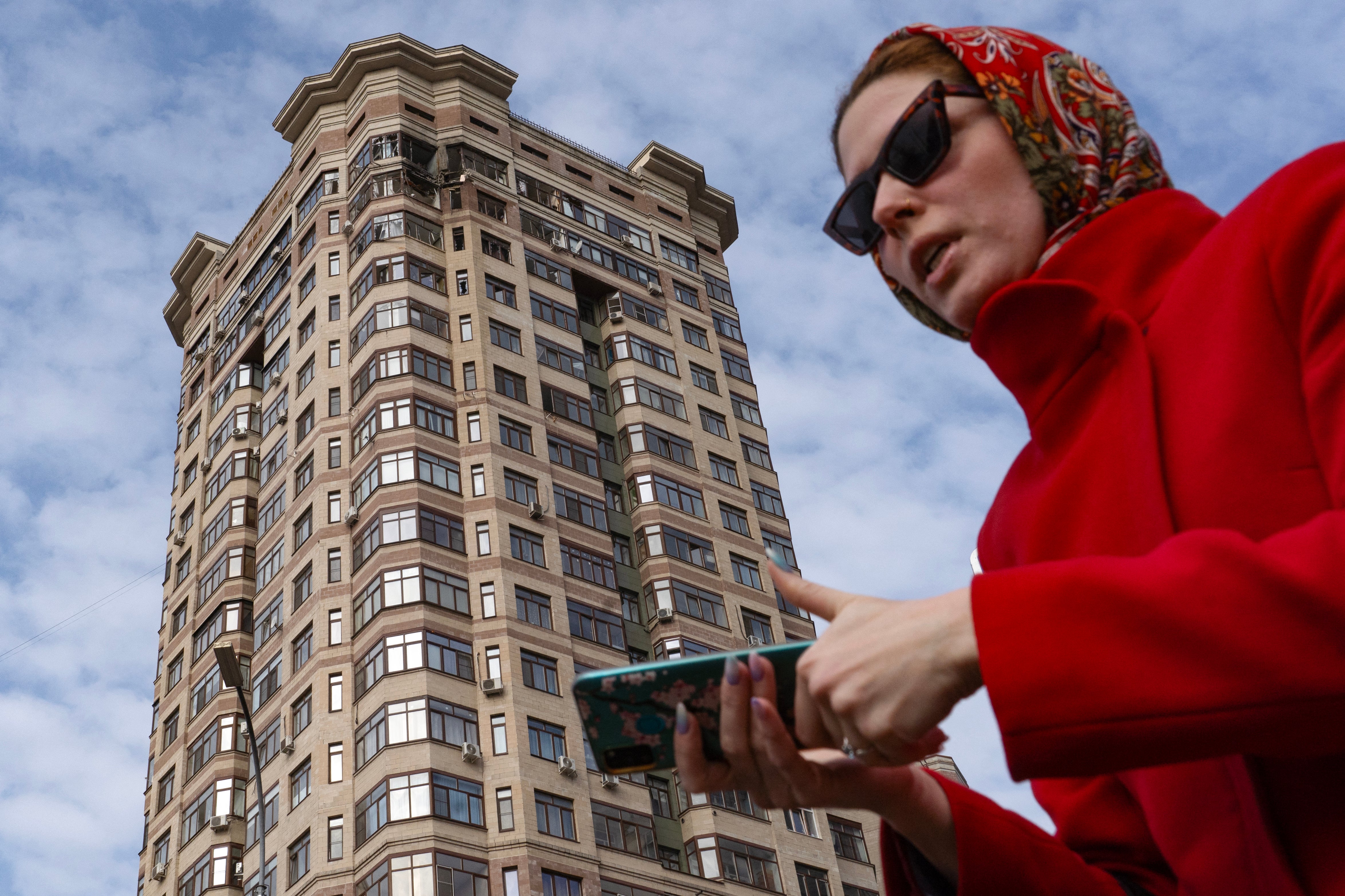 File: A view shows a damaged apartment building following a drone attack in the town of Ramenskoye in the Moscow