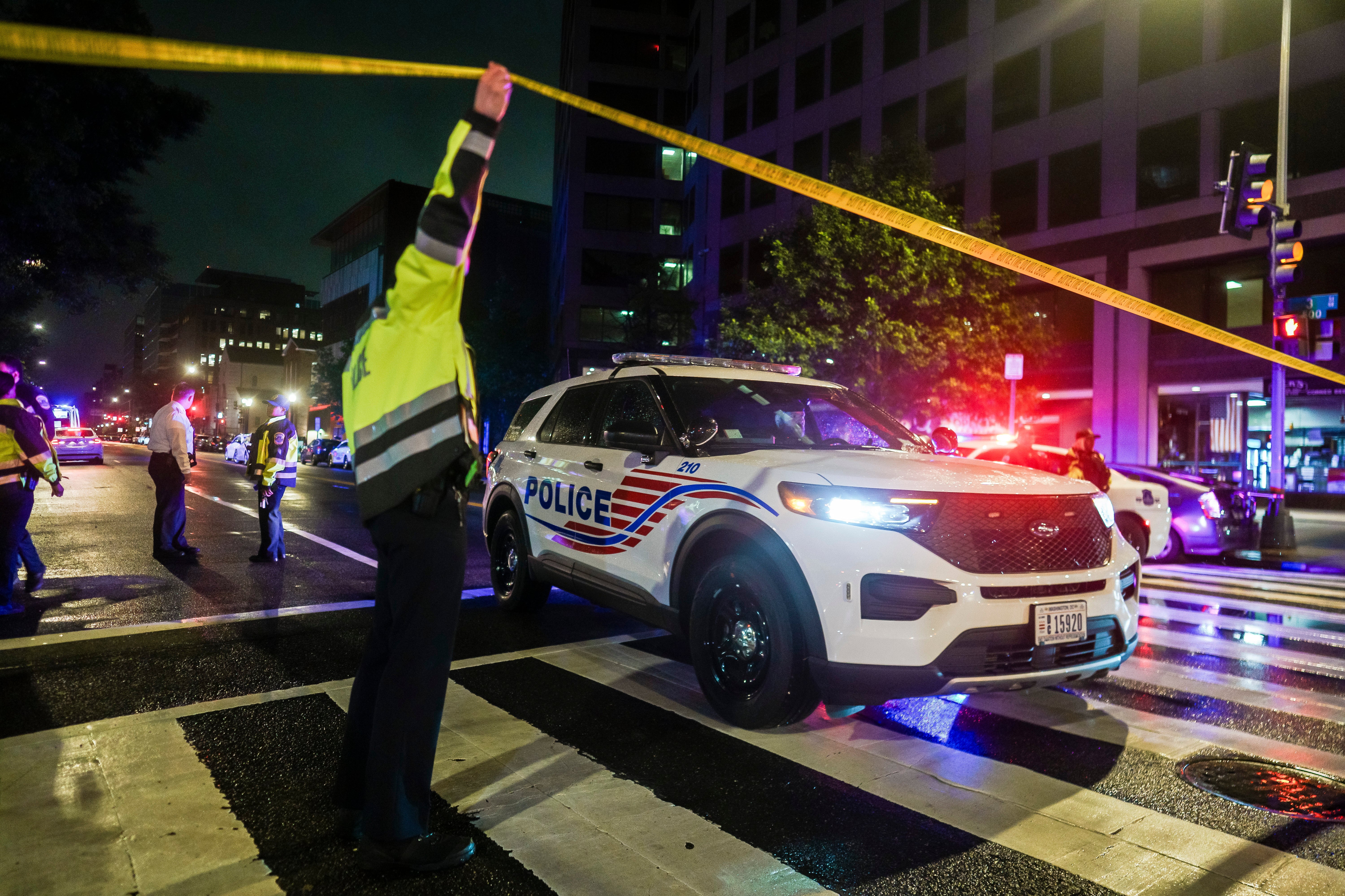 Several people gathered near the scene of the shooting