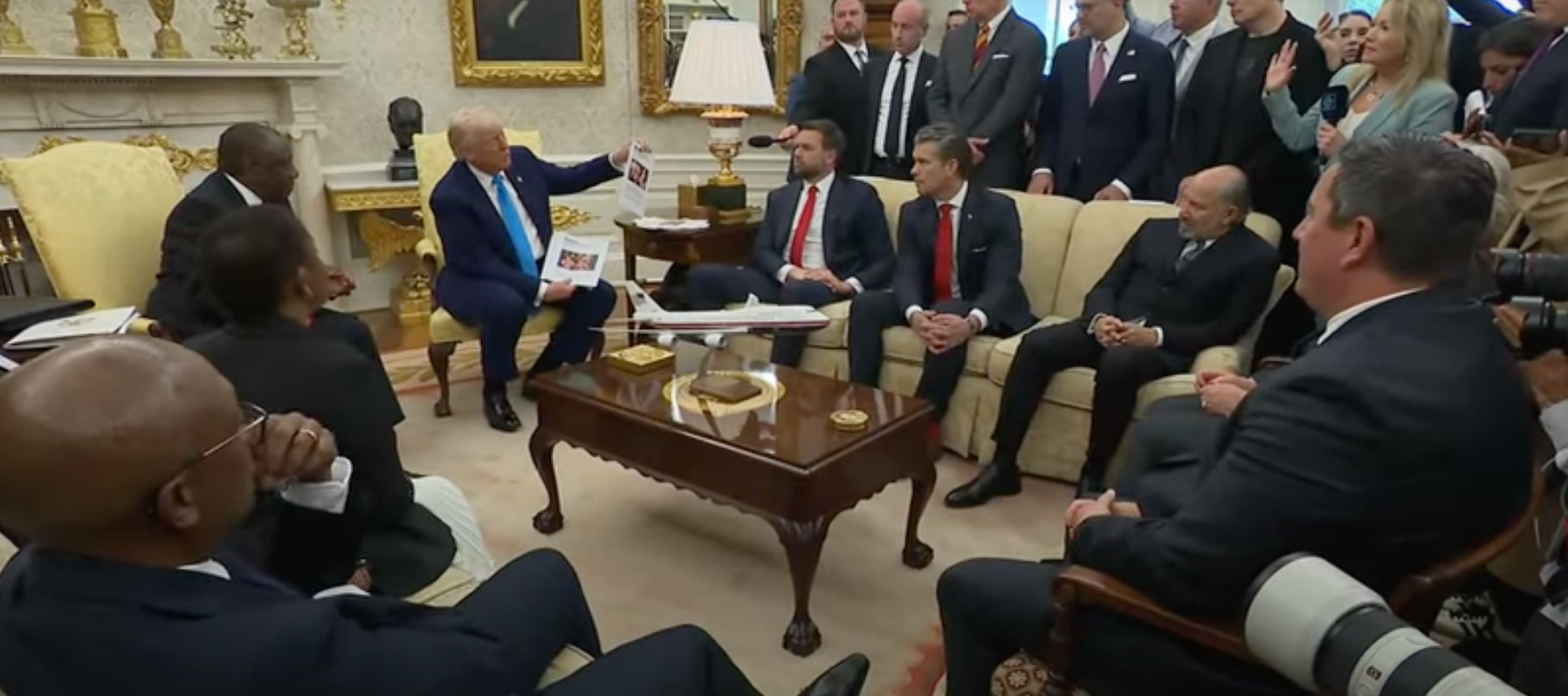 Trump mistakenly flaunts wrong article about violence in DRC when speaking on alleged 'white genocide' in South Africa