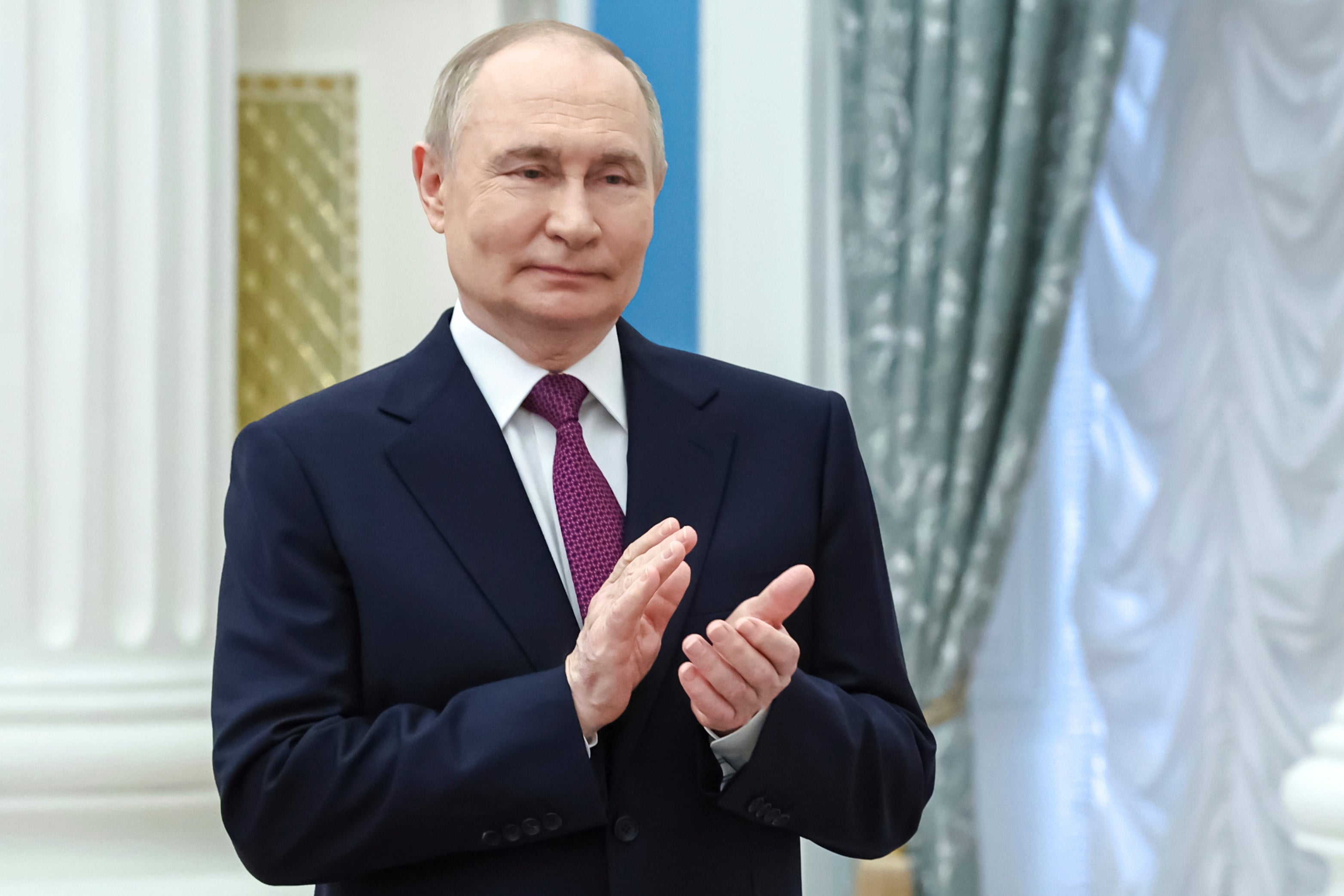 Russian president Vladimir Putin attends a ceremony to present highest state awards in the Catherine Hall of the Kremlin's Senate Palace in Moscow