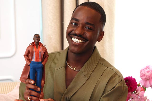 Ncuti Gatwa holding his Doctor Who Barbie Doll (Isabel Infantes/PA Media Assignments)