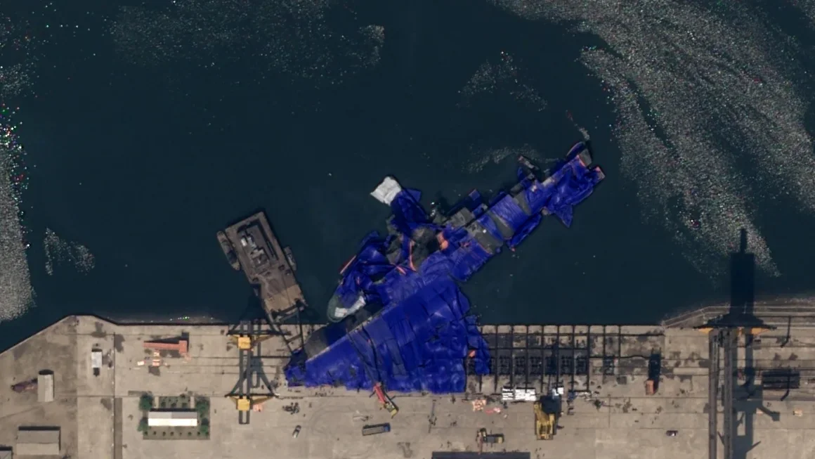 North Korean destroyer lying on its side in satellite images