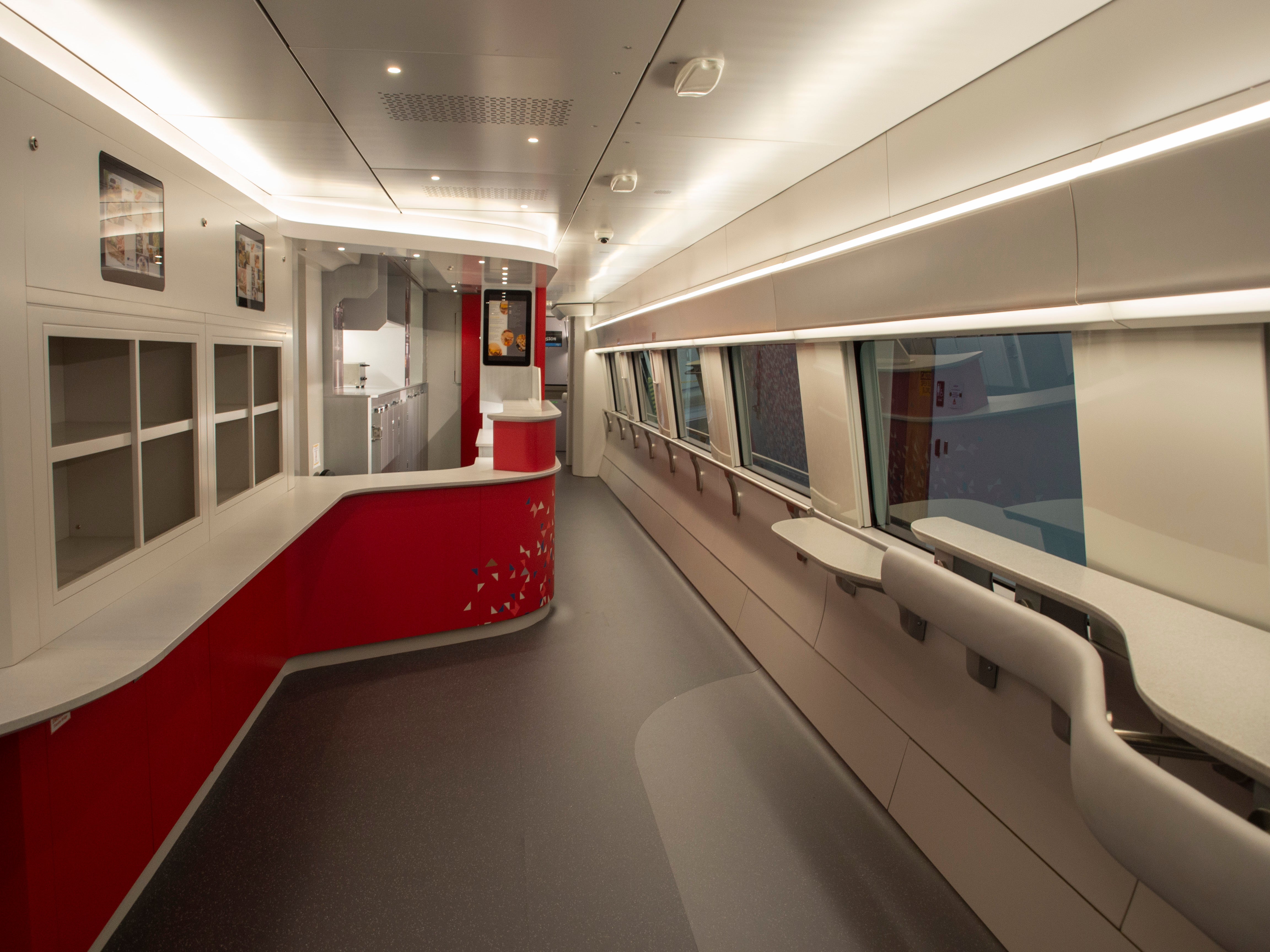 Features on the new Acela trains include onboard café cars (above), Wi-Fi, in-seat USB ports and plug sockets, winged headrests that Amtrak says "provide more comfort and separation", and seat covers made out of recycled leather