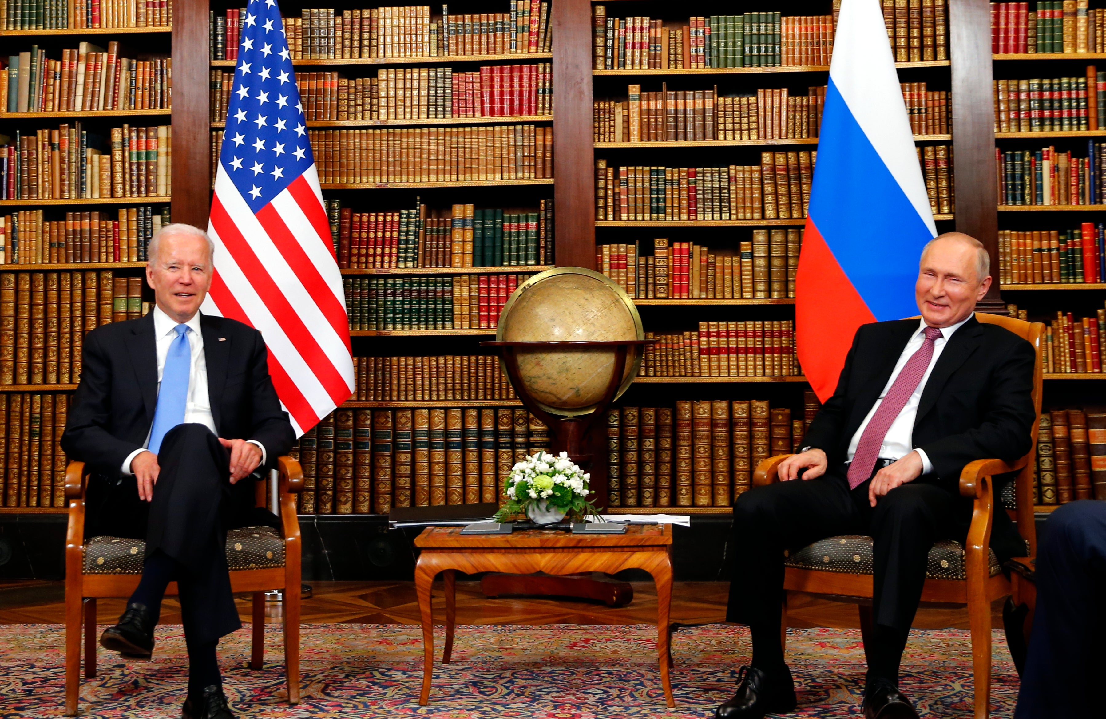 Former US president Joe Biden and Russia's president Vladimir Putin meet at the start of the US-Russia summit at Villa La Grange in Geneva