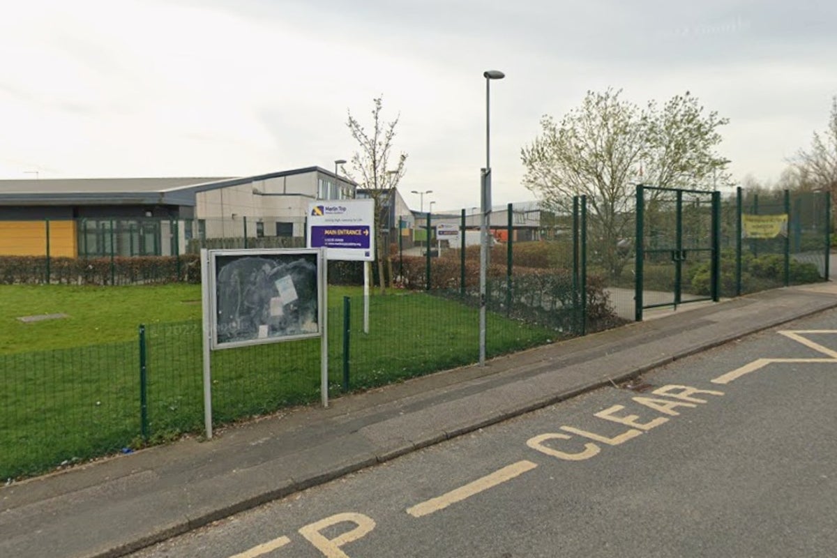 Primary school teacher who turned up at house with two kitchen knives banned from the classroom