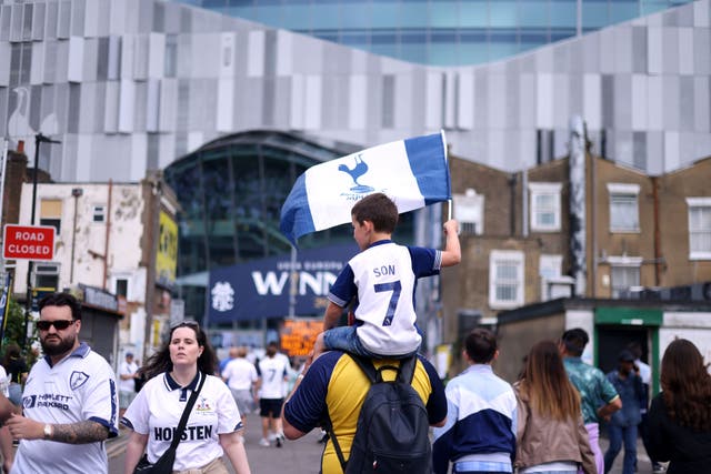 <p>Tottenham fans lined the streets to hail the Europa League winners (Steven Paston/PA)</p>