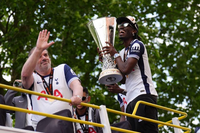 Manager Ange Postecoglou and Yves Bissouma enjoy Tottenham’s Europa League celebrations (John Walton/PA)