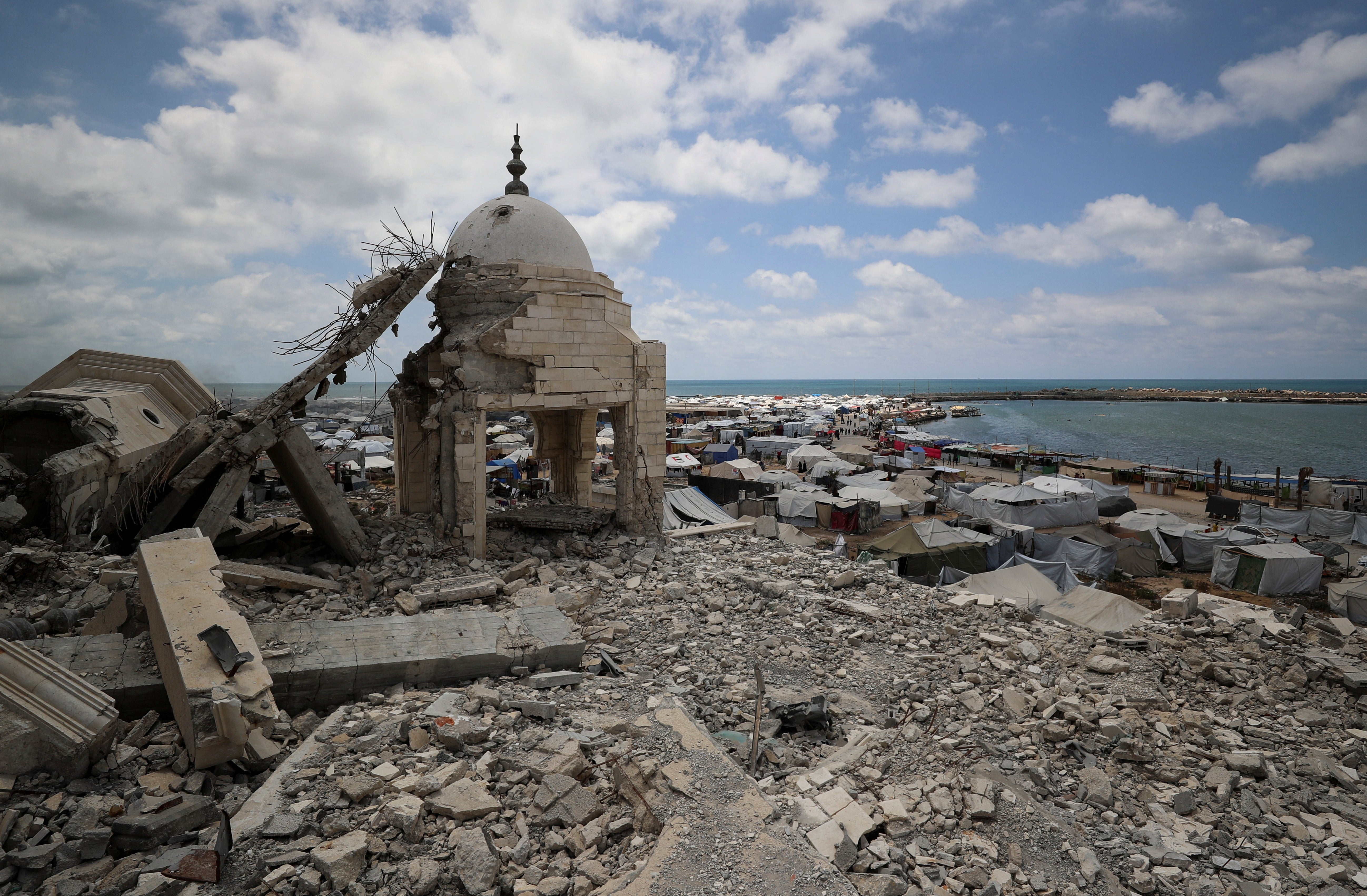 Palestinians displaced by Israeli military offensive shelter in tents in Gaza City