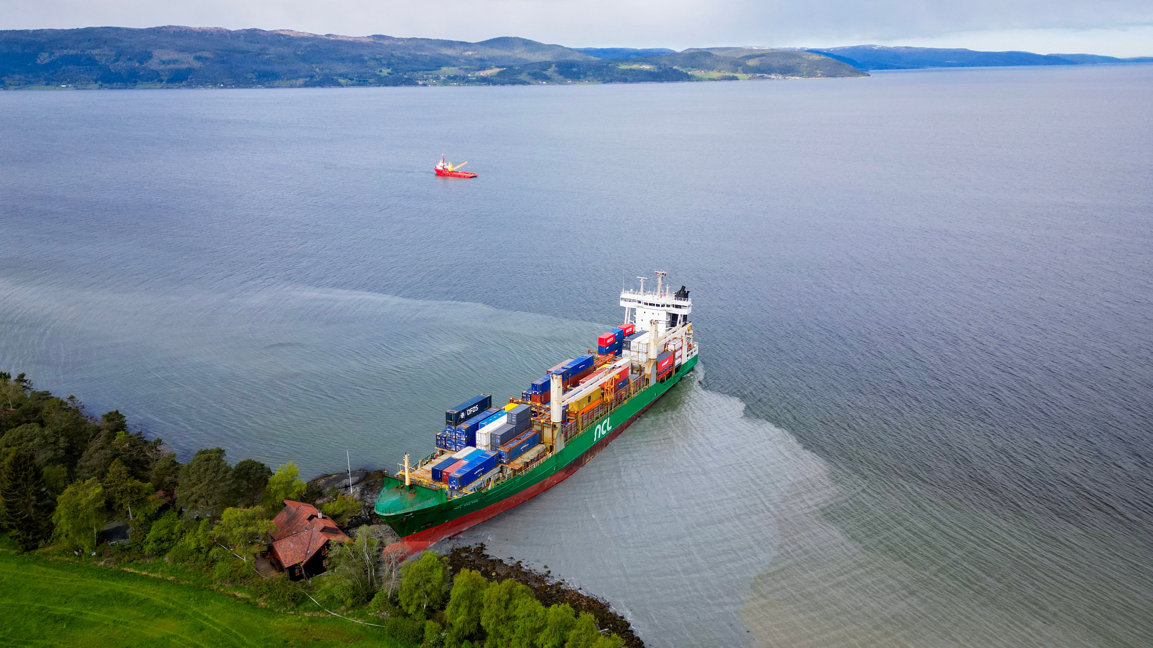 An areal view shows how close the ship came to the house