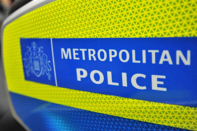 <p>General view of a Metropolitan Police sign on the side of a BMW London Metropolitan police motorcycle</p>