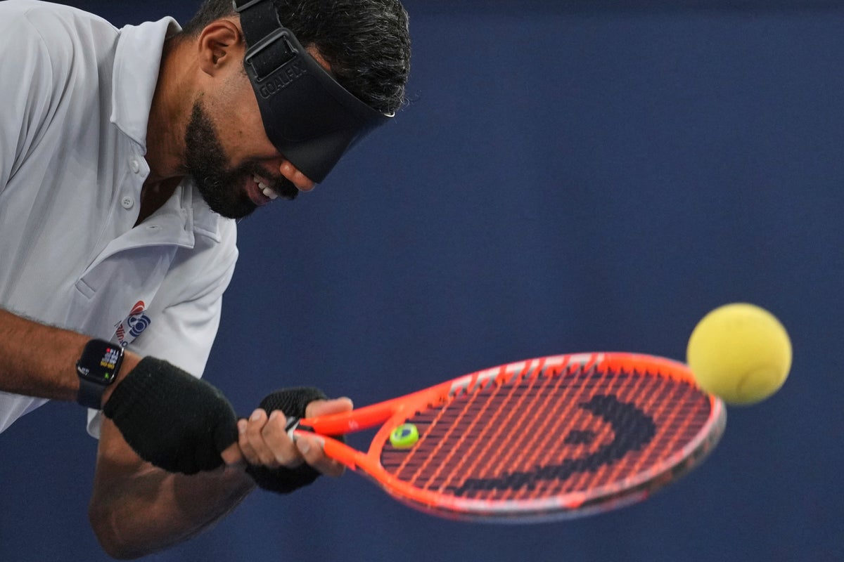 AP PHOTOS: Blind Tennis Naqi's Journey