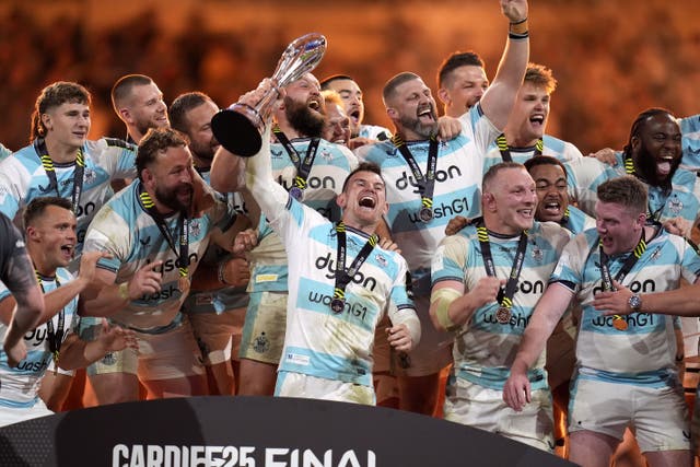 Ben Spencer holds aloft the EPCR Challenge Cup and celebrates with team-mates (Andrew Matthews/PA)