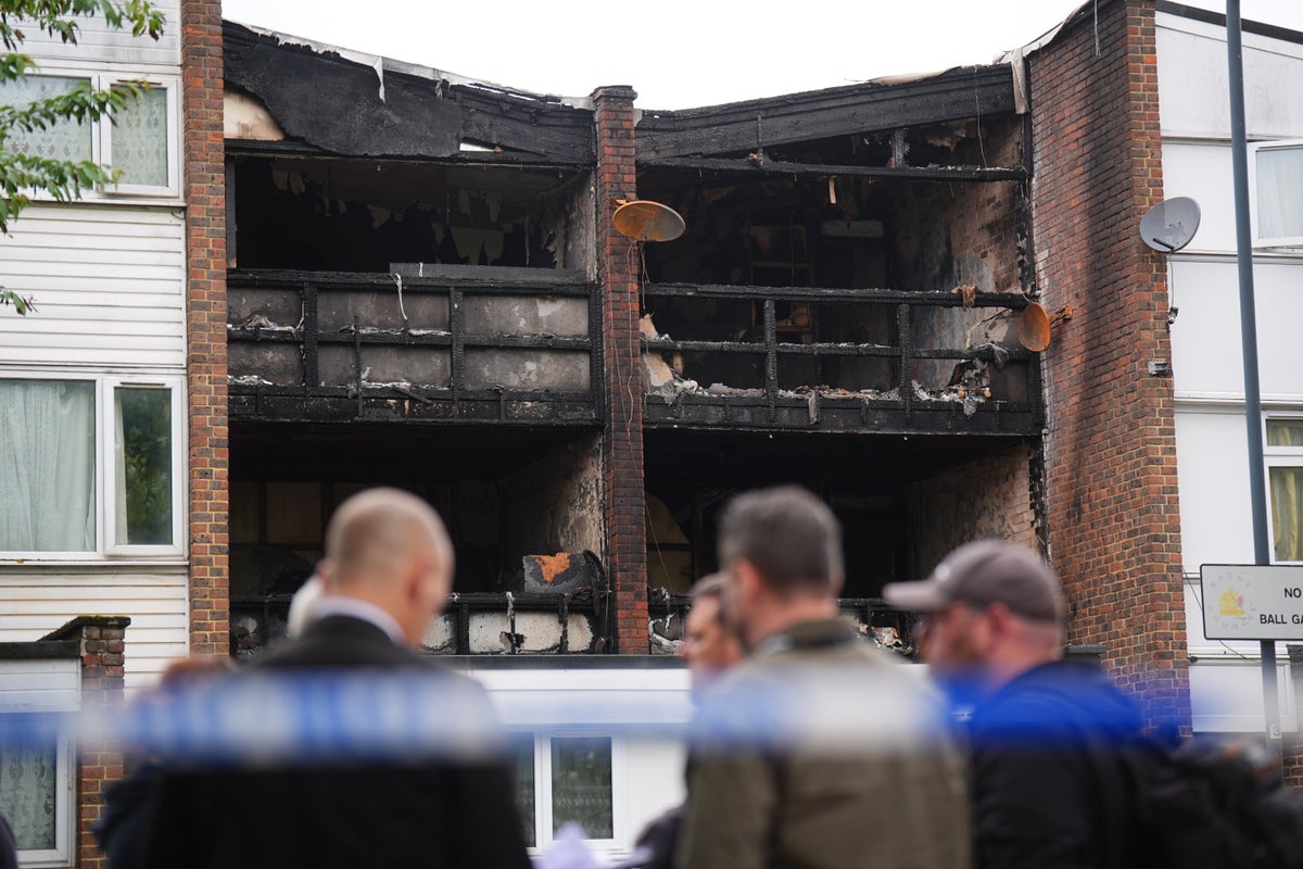 Mother and three children killed in house fire in north London as man arrested on suspicion of murder