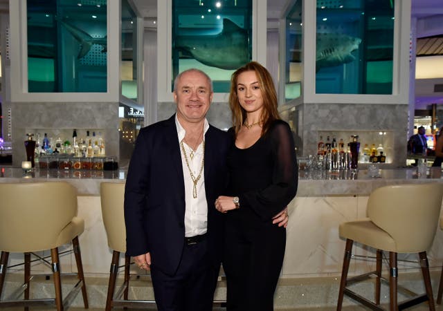 <p>Damien Hirst with his girlfriend Sophie Cannell</p>