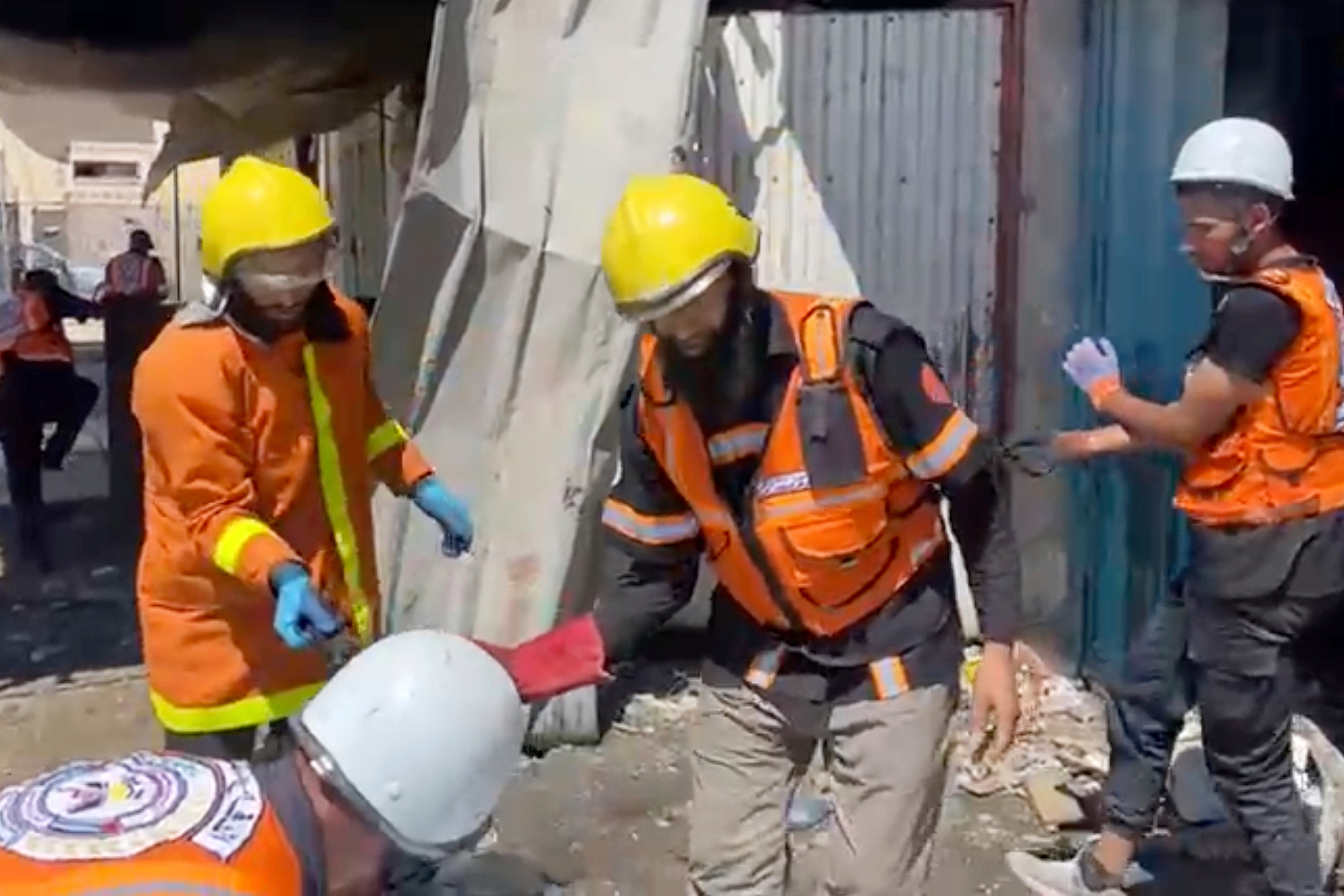 The doctor was at work when the missile struck her home, killing nine of her children, her colleagues said