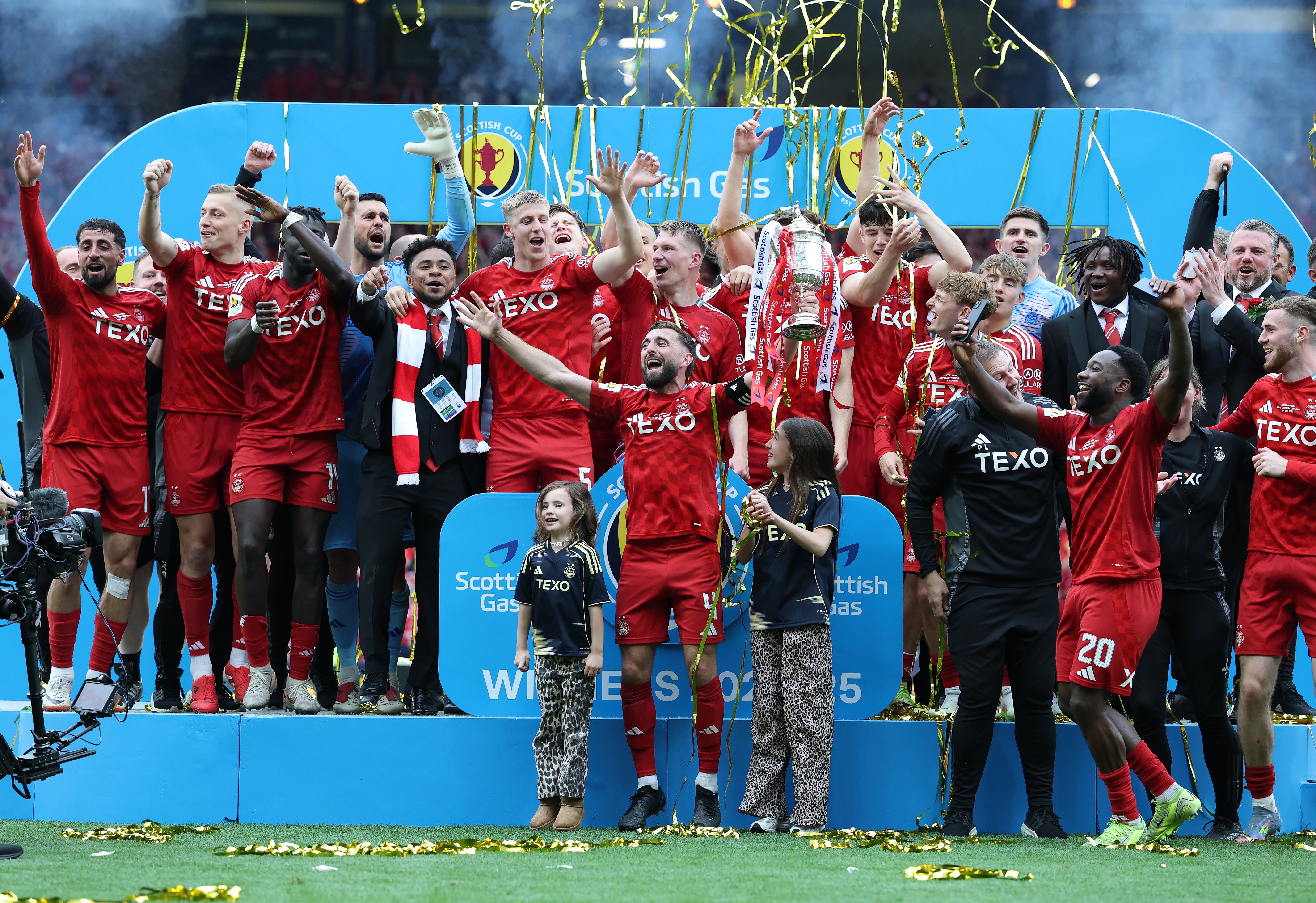 The Dons lifted the trophy after the shootout