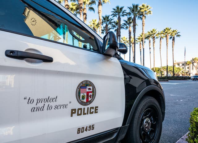 <p>Roberto Martinez took his 14-year-old son on a graffiti spree in downtown LA on February 10 and later came across Kevin Rivera, according to the LAPD. The teenager is alleged to have shot and killed Rivera</p>