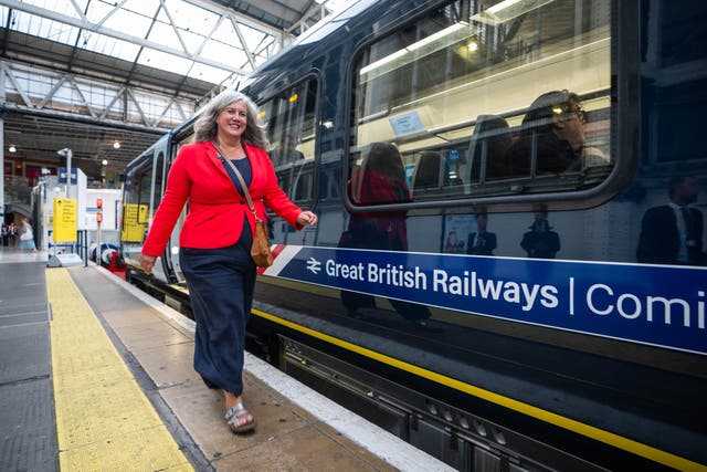 <p>Transport Secretary Heidi Alexander boards the first operational renationalised train service at Waterloo station in central London</p>