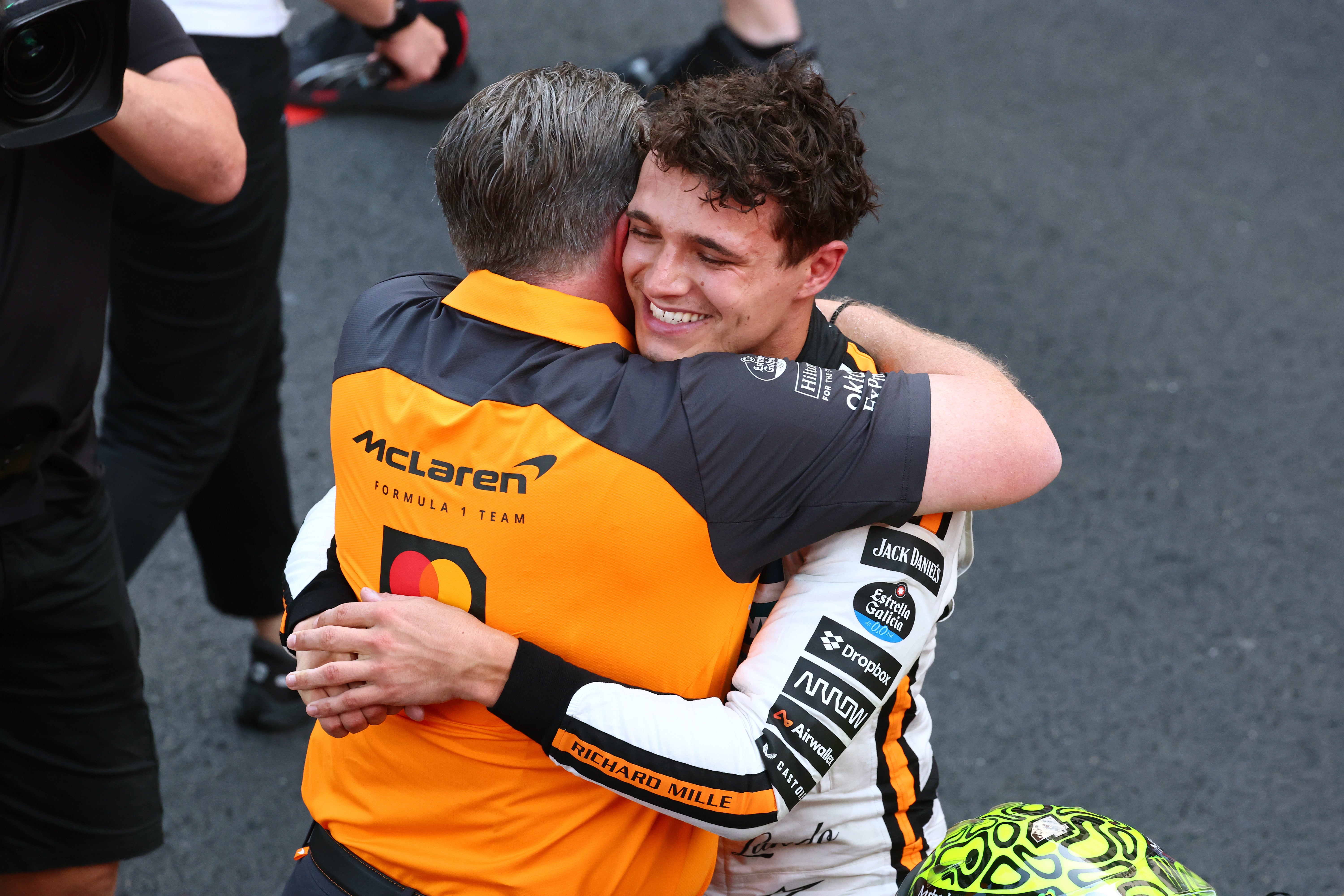 Norris celebrates with McLaren CEO Zak Brown