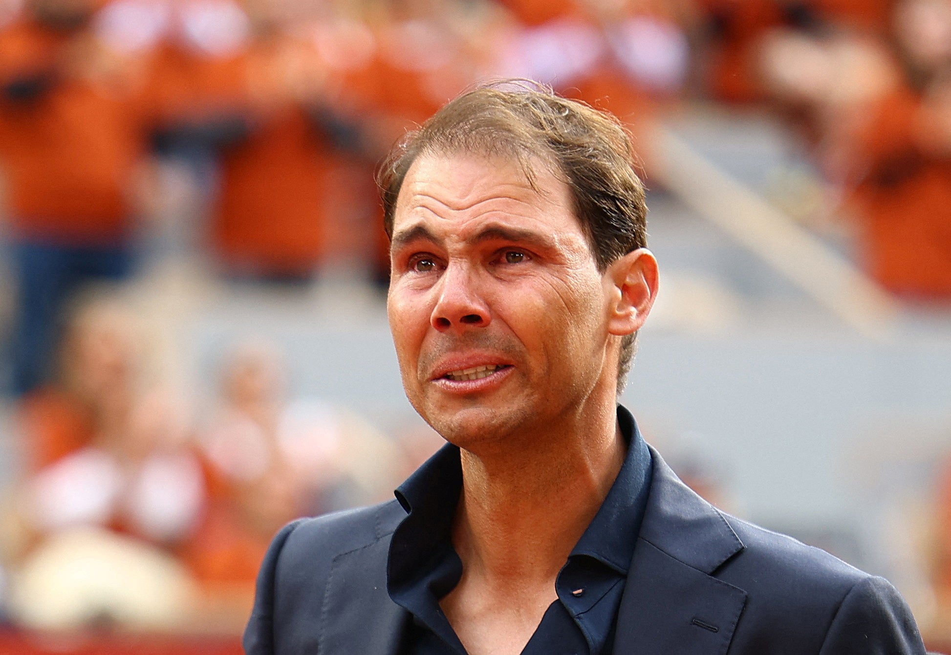 Former tennis player and record French Open winner Rafael Nadal reacts during a tribute