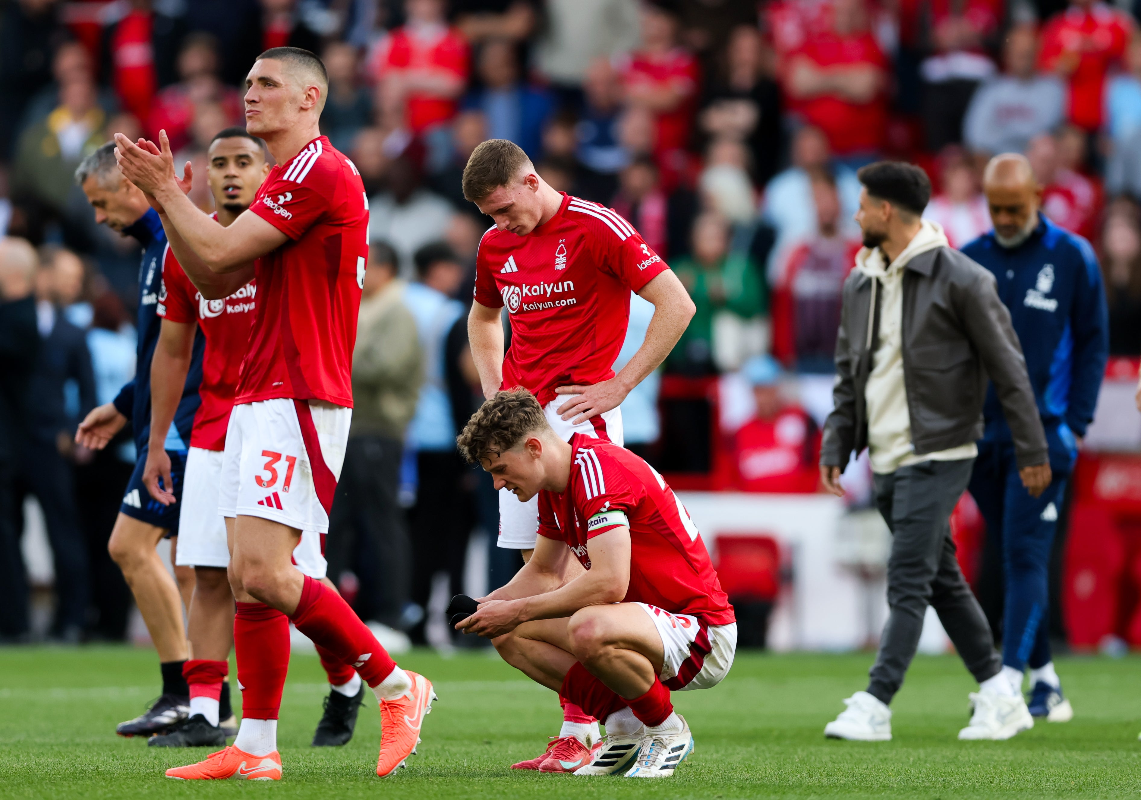 Nottingham Forest's Ryan Yates sits dejected