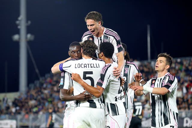 Randal Kolo Muani (left) celebrates with Juventus team-mates after scoring in the 3-2 win at Venezia which secured Champions League football next season (Paola Garbuio/LaPresse via AP)